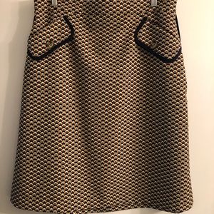 Yellow patterned skirt with pockets